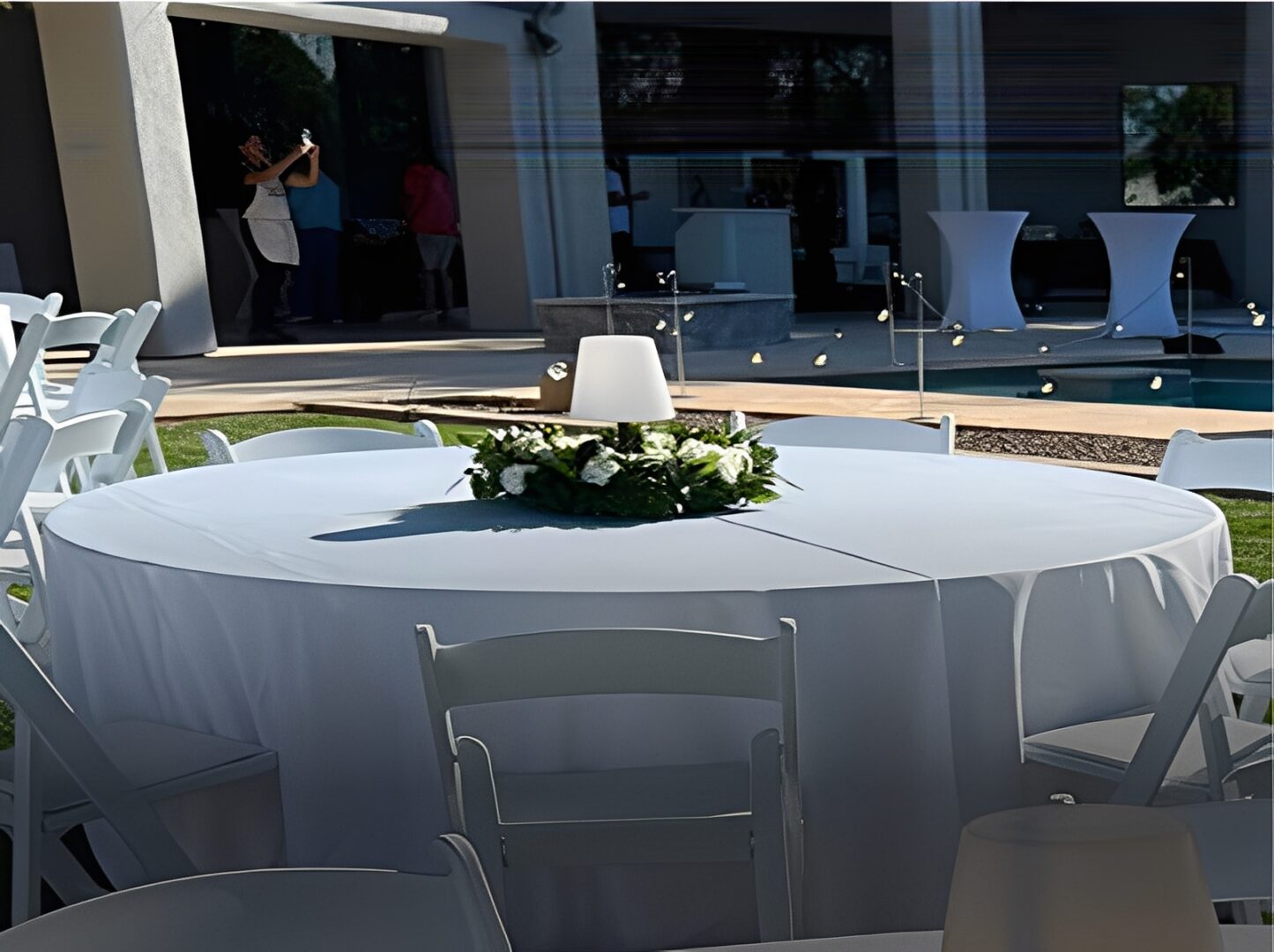 Outdoor event setup with round table