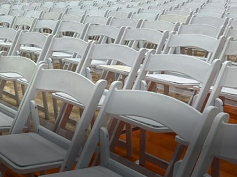 Empty chairs arranged in rows
