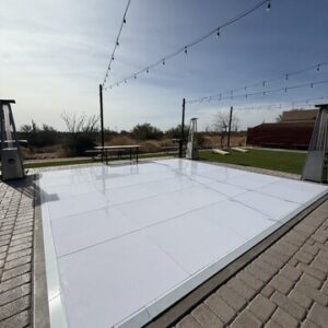 Outdoor dance floor under string lights
